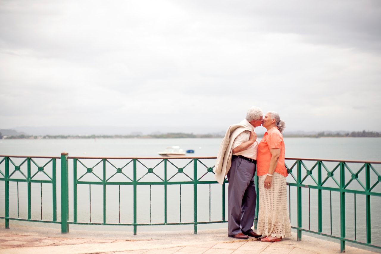Conscious Love elderly couple kissing